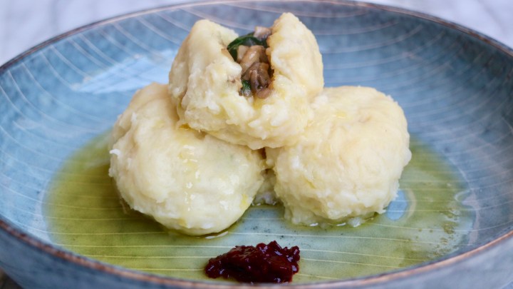 Veggie potato dumplings (Kroppkakor) with mushrooms, shallots and spinach.