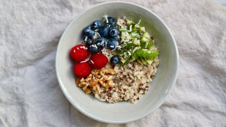 Breakfast oatmeal with quinoa, chia seeds and oat milk