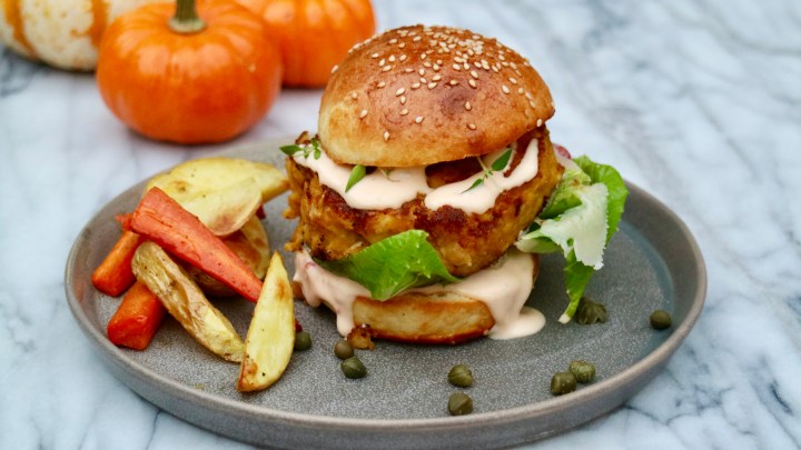 Halloween pumpkin burger with potato and carrot wedges