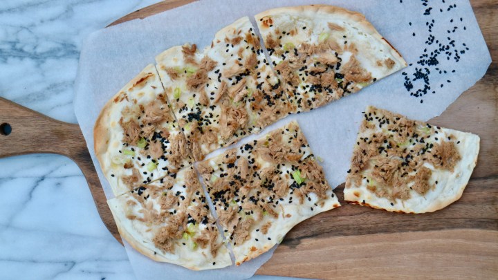 Flammkuchen with tuna, green onion and sesame seeds