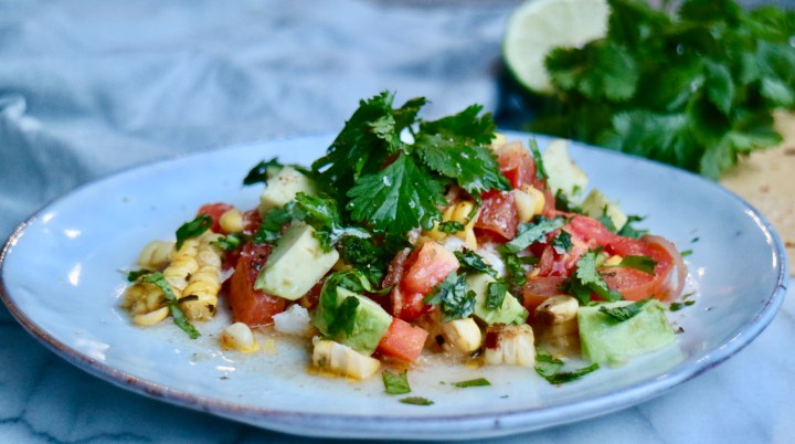 Cod with tomato, corn, avocado and cilantro