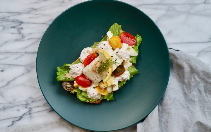 Steamed cod on a sourdough toast with egg, horseradish and caviar sauce