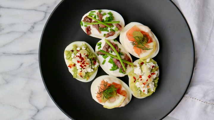 Easter deviled eggs with smoked salmon, avocado and anchovy