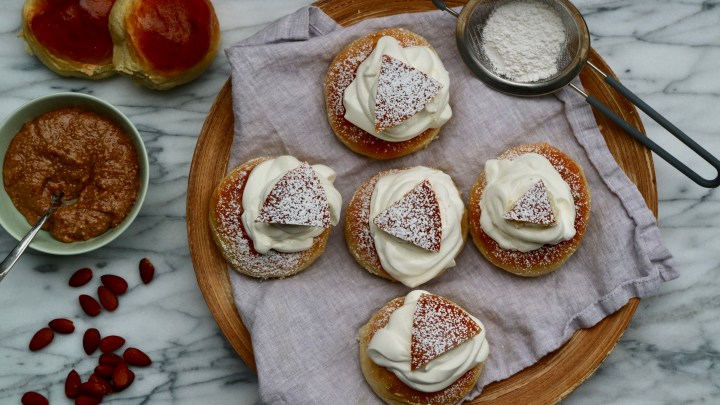 Swedish Semla with roasted almond filling (filled cardamom bun)